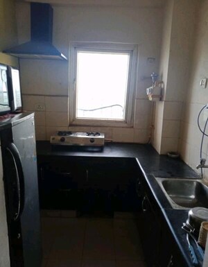 Kitchen in 2 BHK Apartment at Nimbus Express Park View - II, Chi V Greater Noida – for Rent