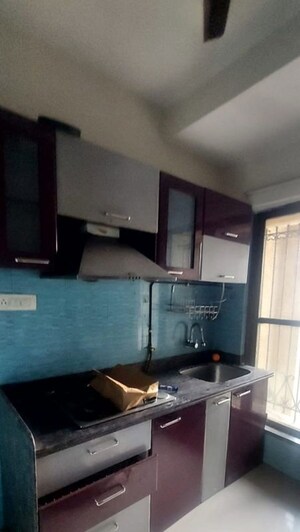 Kitchen in 2 BHK Apartment at Tharwani Rosewood Heights, Kharghar Sector 10 – for Sale