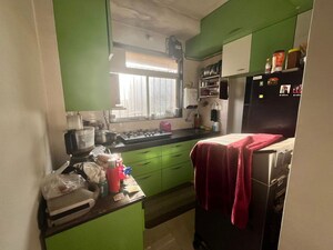 Kitchen in 1 BHK Apartment at Shraddha Valencia, Kanjur Village – for Sale
