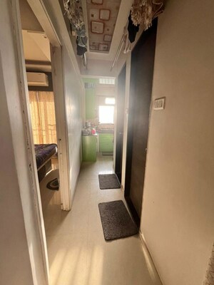 Building Lobby in 1 BHK Apartment at Shraddha Valencia, Kanjur Village – for Sale