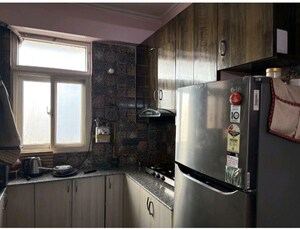 Kitchen in 2 BHK Apartment at Amrapali Castle, Chi V Greater Noida – for Rent