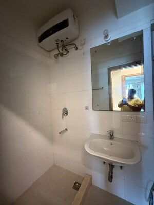 Bathroom in 3 BHK Apartment at DLF New Town Heights II, Sector 86 – for Rent