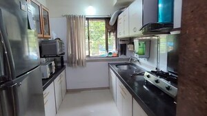 Kitchen in 2 BHK Apartment at Concrete Sai Sansar, Chembur – for Rent