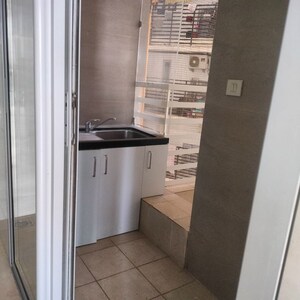 Kitchen in 3 BHK Apartment at Oberoi Realty Esquire, Goregaon East – for Sale