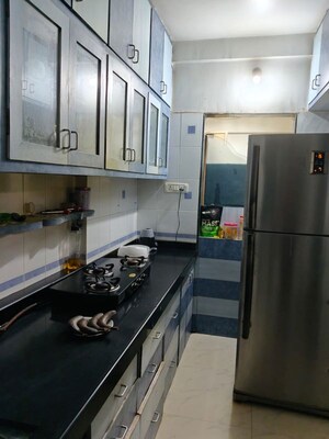Kitchen in 2 BHK Apartment at Awesome Heights, Andheri East – for Rent