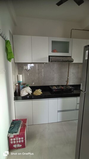 Kitchen in 2 BHK Apartment at Sheth Auris Bliss, Malad West – for Rent