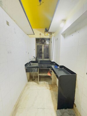 Kitchen in 1 BHK Apartment at Dharmendra CHS, Borivali West – for Rent