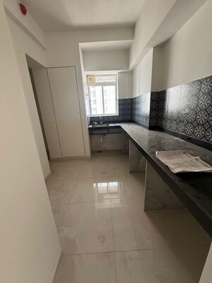 Kitchen in 2 BHK Apartment at Courtyard by Narang Realty and The Wadhwa Group, Pokhran Road No Two – for Rent