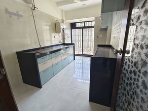 Kitchen in 2 BHK Apartment at Lalani Velentine Apartment 1 Wing D, Malad East – for Rent