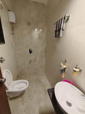 Bathroom in 2 BHK Apartment at Lalani Velentine Apartment 1 Wing D, Malad East – for Rent