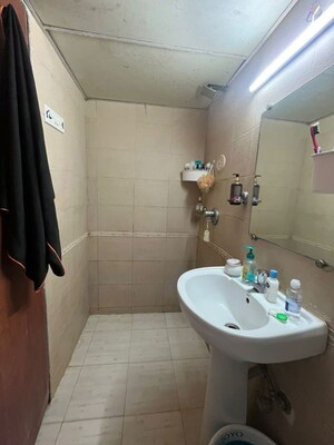 Bathroom in 1 BHK Apartment at Rizvi Complex Phase II , Bandra West – for Rent