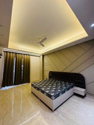 Bedroom in 3 BHK Builder Floor at Ansal Sushant Lok I, Sector 43 – for Rent