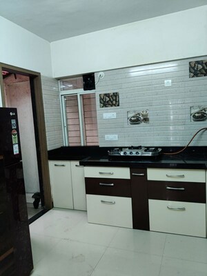 Kitchen in 3 BHK Apartment at Nandan Vatsalya Vihar, Aundh – for Rent