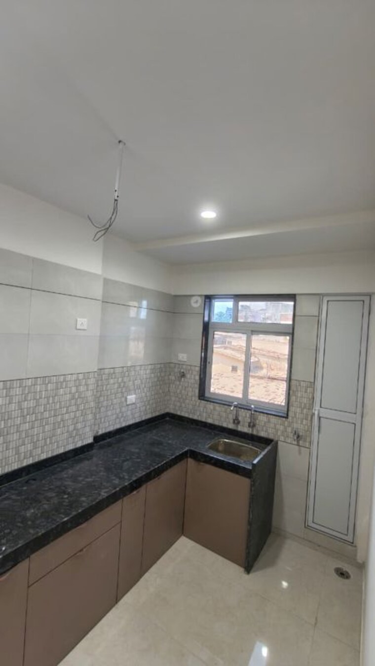 Kitchen, shahad 2 Bedroom 714 Sq.Ft. Apartment In Shahad Thane 10355985
