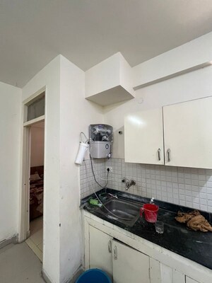 Kitchen in 2 BHK Apartment at Breez Global Heights, Sohna Sector 33 – for Rent