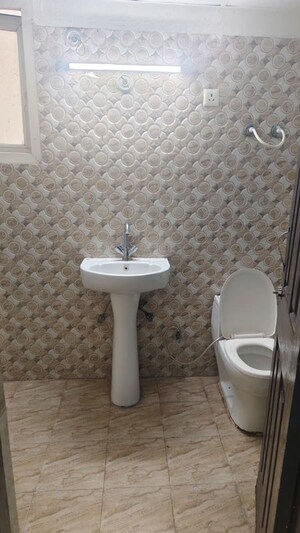 Bathroom in 2 BHK Apartment at KM Residency, Raj Nagar Extension – for Sale