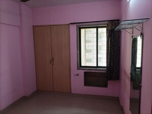 Room in 2 BHK Apartment at Rutu Estate, Brahmand – for Sale