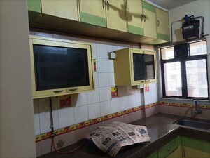 Kitchen in 2 BHK Apartment at Rutu Estate, Brahmand – for Sale