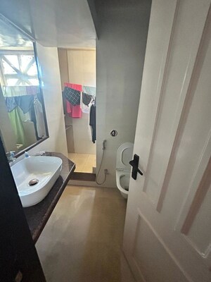 Bathroom in 2 BHK Apartment at Kanakia Sra CHS, Andheri East – for Rent