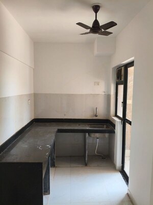 Kitchen in 2 BHK Apartment at Runwal Gardens, Dombivli East – for Rent
