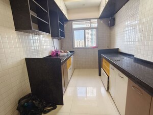 Kitchen in 2 BHK Apartment at Dhoot Sky Residency New Sonali CHSL, Malad West – for Rent
