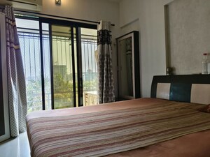 Bedroom in 1 BHK Apartment at Atul Blue Monarch, Andheri East – for Rent
