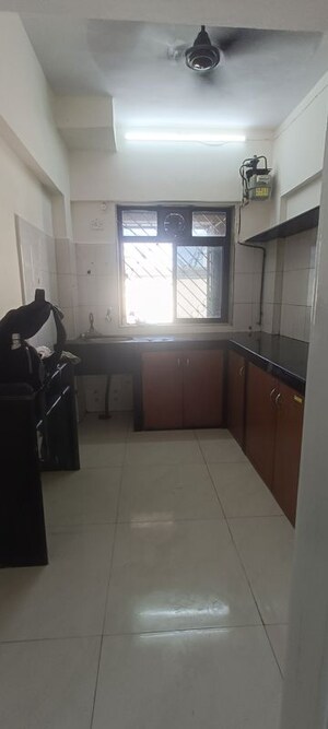 Kitchen in 2 BHK Apartment at Ramchandra Nivas, Kopar Khairane – for Rent