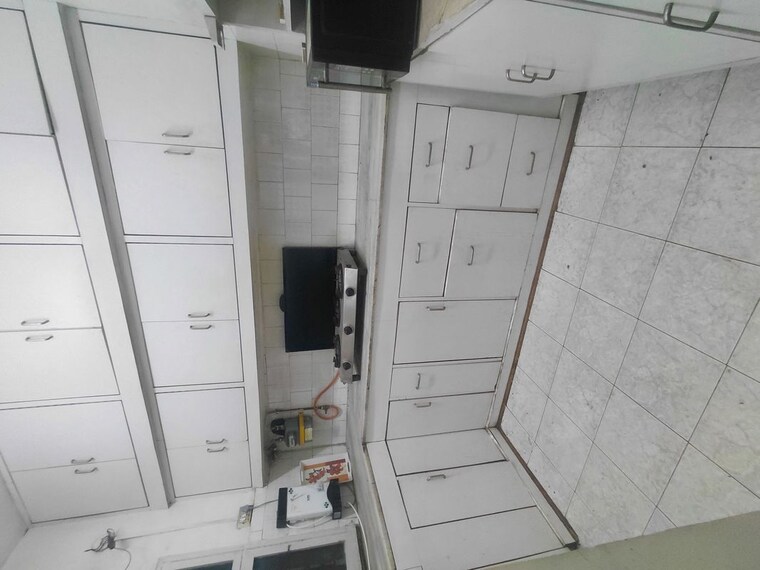 Kitchen, janakpuri 3 Bedroom 1000 Sq.Ft. Apartment In Janakpuri Delhi 10356121
