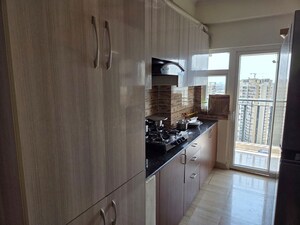 Kitchen in 2.5 BHK Apartment at Amrapali Tropical Garden, Tech Zone 4 Greater Noida – for Sale