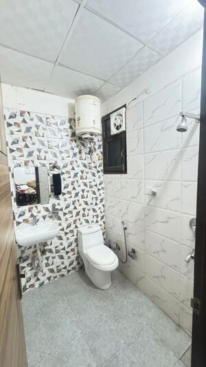 Bathroom in 2 BHK Builder Floor at Raj Nagar Extension – for Sale