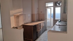 Kitchen in 2.5 BHK Apartment at Amrapali Zodiac, Sector 120 – for Sale