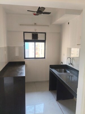 Kitchen in 1 BHK Apartment at Runwal Gardens, Dombivli East – for Rent