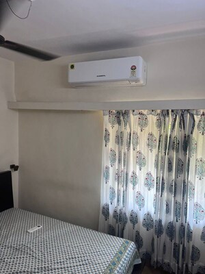 Bedroom in 2 BHK Apartment at Tarapore Gardens, Andheri West – for Rent