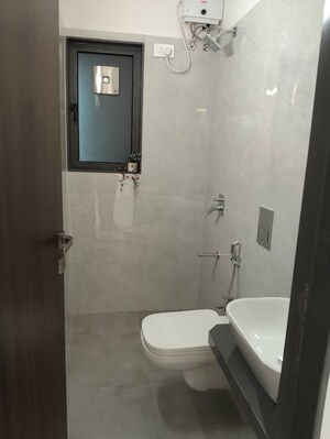 Bathroom in 1 BHK Builder Floor at Pranav Falcon Crest, Malad West – for Sale