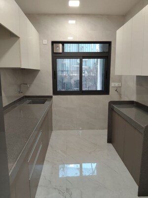 Kitchen in 1 BHK Builder Floor at Pranav Falcon Crest, Malad West – for Sale