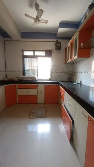 Kitchen in 1 BHK Apartment at Shubharambh Complex, Manpada – for Sale