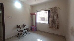 Living Room in 1 BHK Apartment at Shubharambh Complex, Manpada – for Sale