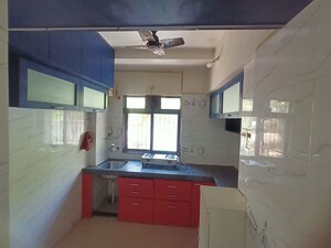 Kitchen in 1 BHK Apartment at Raunak Unnathi Woods, Ghodbunder Road – for Rent