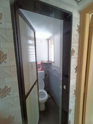 Bathroom in 1 BHK Apartment at Raunak Unnathi Woods, Ghodbunder Road – for Rent