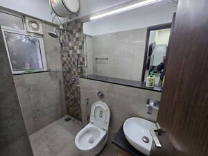 Bathroom in 3 BHK Apartment at Omkar Meridia, Kurla West – for Rent