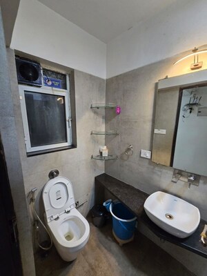 Bathroom in 3 BHK Apartment at Omkar Meridia, Kurla West – for Rent