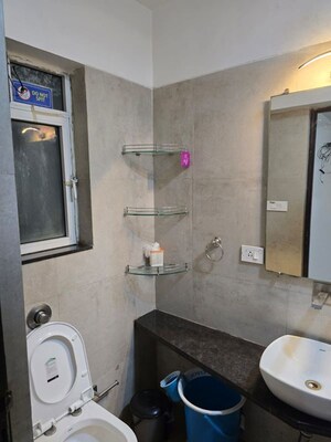 Bathroom in 3 BHK Apartment at Omkar Meridia, Kurla West – for Rent