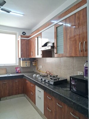 Kitchen in 2 BHK Apartment at Mahagun My Woods, Sector 16c Greater Noida – for Sale