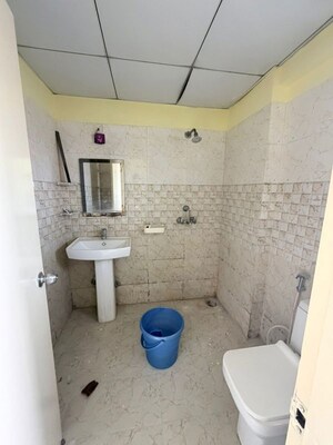 Bathroom in 3 BHK Apartment at Mahagun My Woods, Sector 16c Greater Noida – for Rent