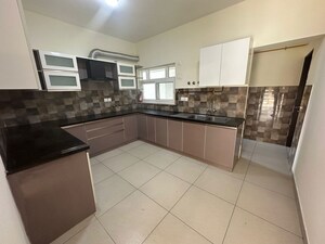 Kitchen in 4 BHK Apartment at Prestige Pine Wood, Koramangala – for Rent
