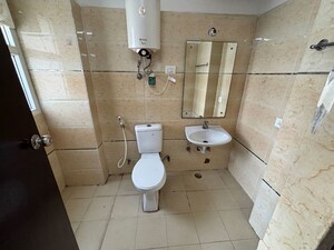 Bathroom in 3 BHK Apartment at Antriksh Golf View - II, Sector 78 – for Rent