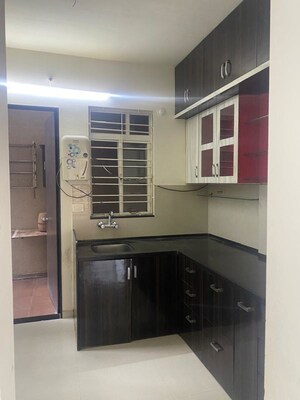 Kitchen in 2 BHK Apartment at Silveroak Shriyans Apartment, Punawale – for Rent