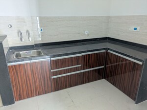 Kitchen in 2 BHK Apartment at Silveroak Shriyans Apartment, Punawale – for Rent