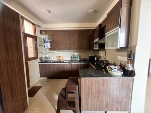 Kitchen in 3 BHK Apartment at Mahagun Moderne, Sector 78 – for Rent