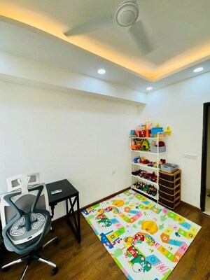 Bedroom in 3.5 BHK Builder Floor at DLF Gardencity Enclave, Sector 93 – for Sale